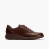 Zapato de cuero marrón con cierre de cremalleras y cordones, diseño elegante y cómodo para hombres, ideal para vestir o casual. En tiendas de calzado Luis Rico, referencia en calzado de calidad.