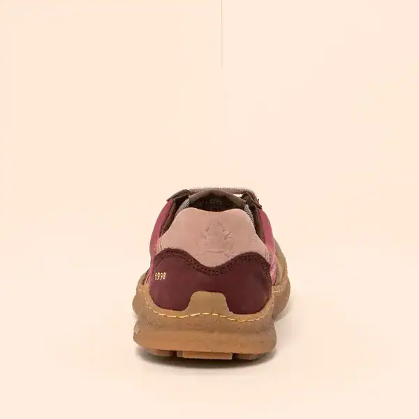 Zapatillas de deporte de mujer en tonos rosa y burdeos, con suela cómoda para uso diario, de la tienda de calzado Luis Rico.