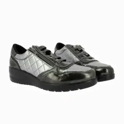 Zapatos de mujer negos y plateados con cierre lateral y suela antideslizante, ideales para moda y comodidad.